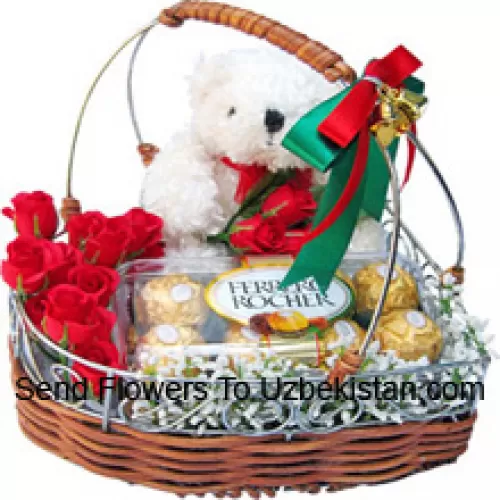 Un beau panier composé de roses, 16 pièces de Ferrero Rochers et un mignon ours en peluche blanc