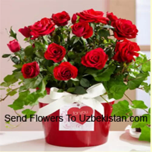 A Beautiful Arrangement Of 19 Red Roses With Seasonal Fillers