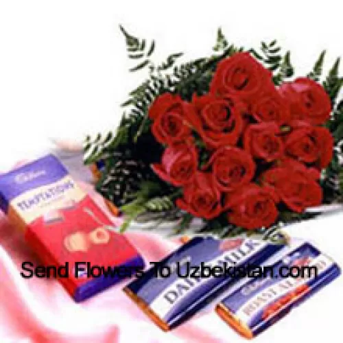 Bouquet de 11 roses rouges avec des chocolats assortis