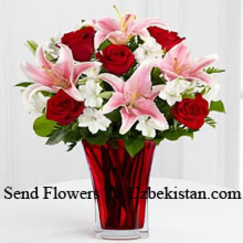 6 Red Roses And 5 Pink Lilies With Seasonal Fillers In A Beautiful Glass Vase