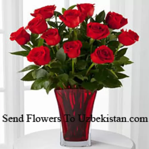 11 Red Roses With Some Ferns In A Vase