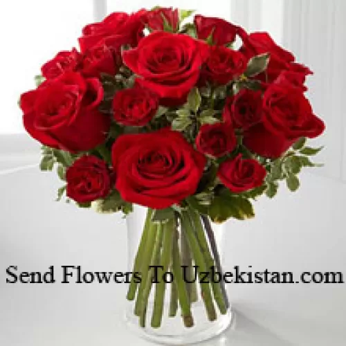 19 Red Roses With Some Ferns In A Vase