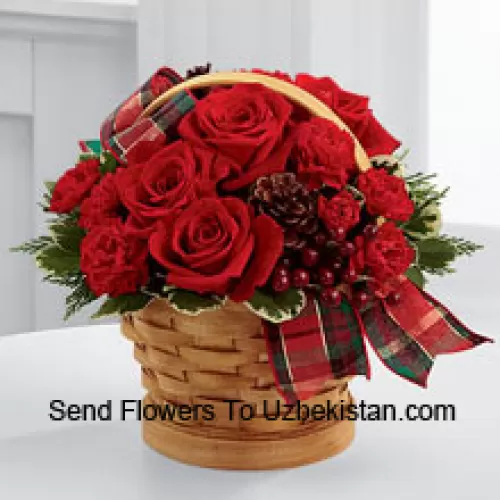 Greet your special recipient with seasonal beauty and blessings. Red roses and mini carnations are gorgeously arranged in a natural woodchip basket with assorted holiday greens, natural pinecones, and berry pics, accented with a tartan plaid ribbon to create a gift that wishes everything this wondrous season has to offer (Please Note That We Reserve The Right To Substitute Any Product With A Suitable Product Of Equal Value In Case Of Non-Availability Of A Certain Product)