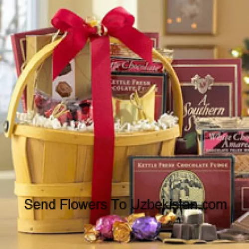 A classic combination of the finest gourmet chocolates make this a gift basket perfect for anybody that loves sweets. Includes Italian Chocolate Truffles, crunchy Almond Roca, a White Chocolate Amaretto Wafers, Chocolate Fudge, creamy rich Milk Chocolate, Belgian Chocolates, and assorted individually-wrapped Godiva Chocolates. We pack it all in a reusable handle basket and ship your gift straight to your recipients. (Please Note That We Reserve The Right To Substitute Any Product With A Suitable Product Of Equal Value In Case Of Non-Availability Of A Certain Product)